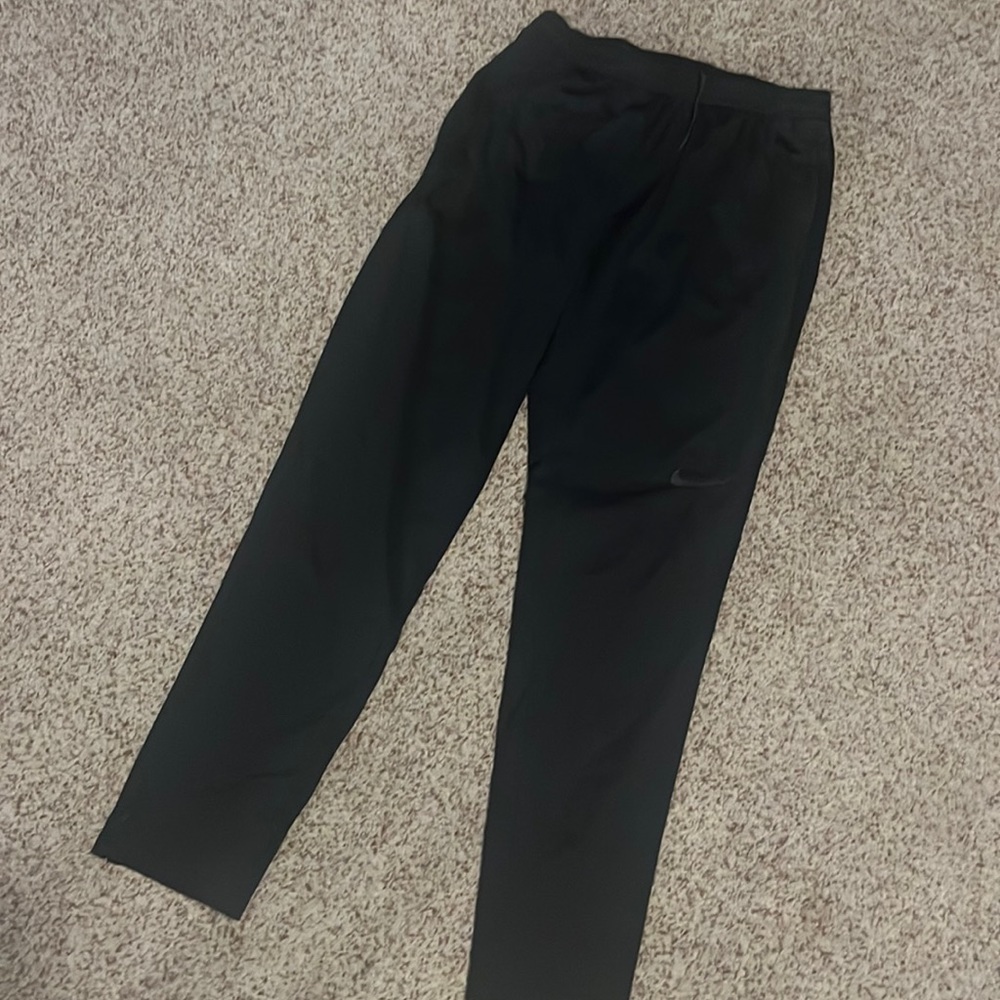 slim fit Nike pants, tapered leg